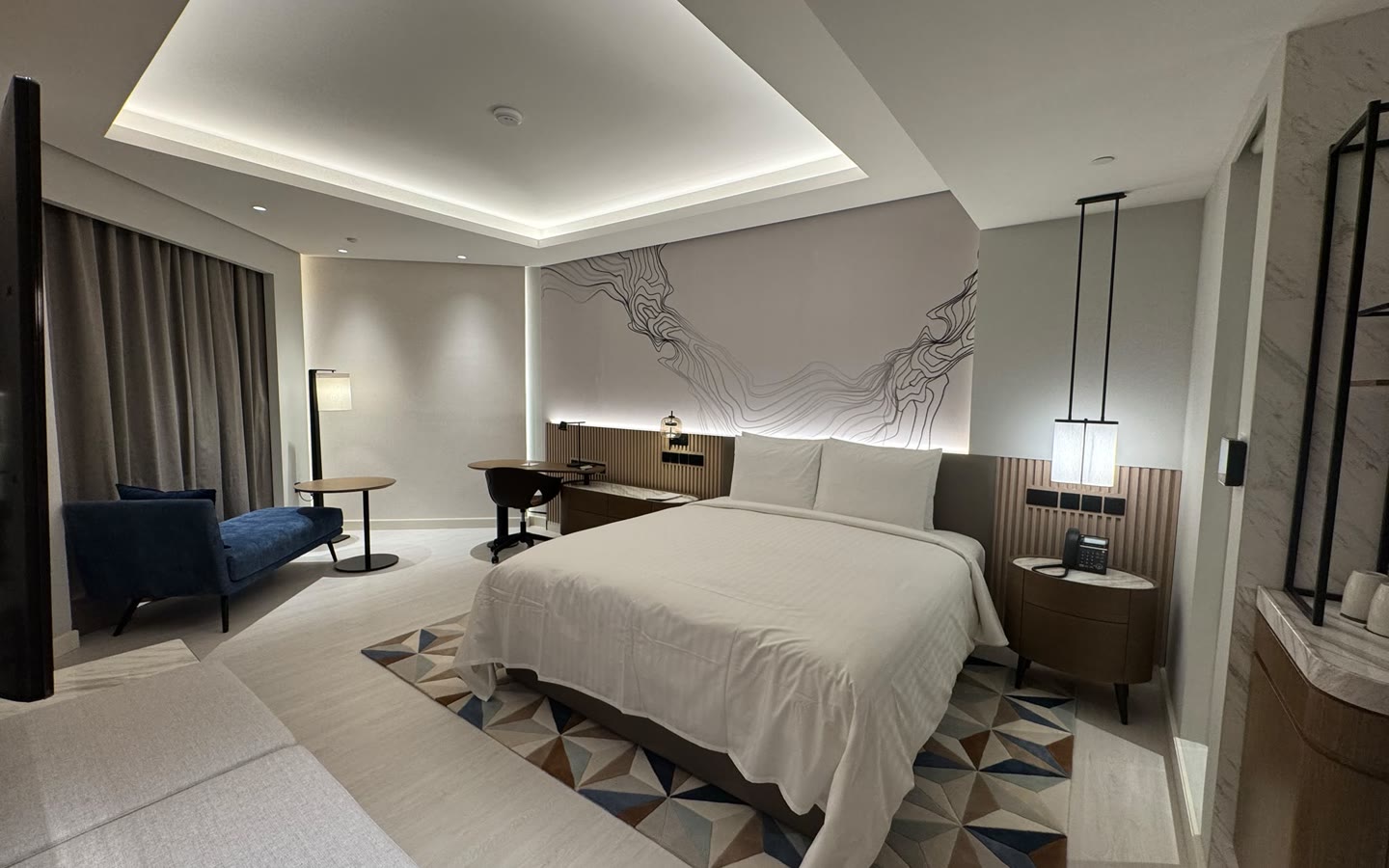 The delivered guest room — same view, finished